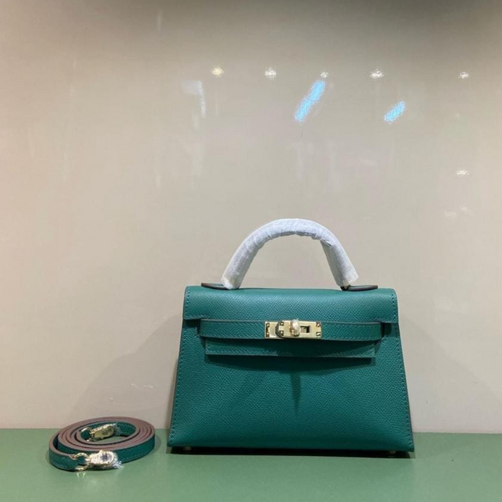 HERMÈS KELLY 20 BAG WITH GOLD HARDWARE IN GREEN