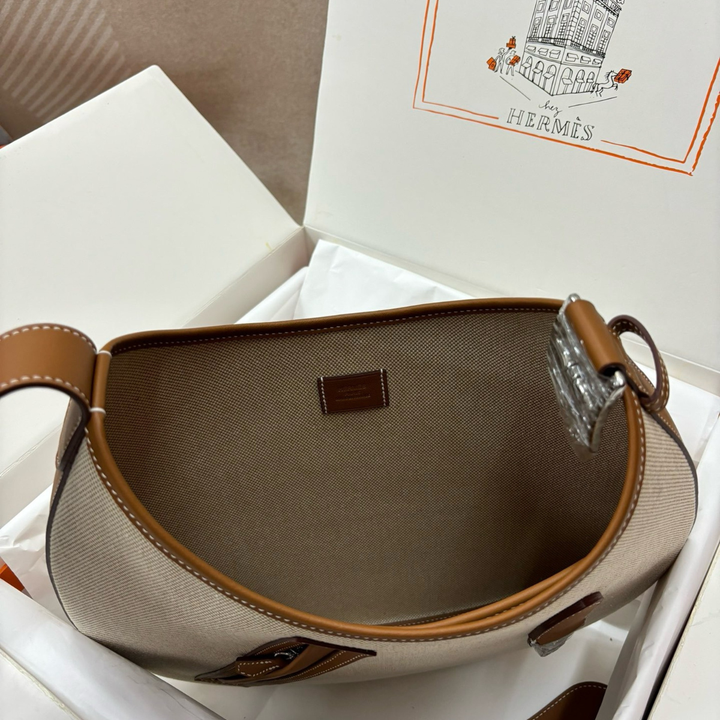 P’TIT ARÇON BAG IN CANVAS & LEATHER HERMÈS