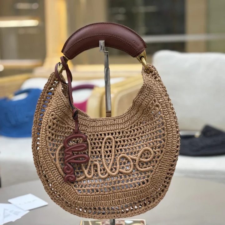 CHLOÉ HOT SUMMER BANANA BAGS IN RAFFIA