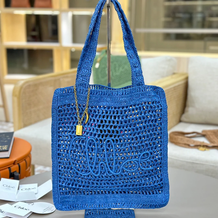 CHLOÉ SUMMER BANANA BAG IN RAFFIA